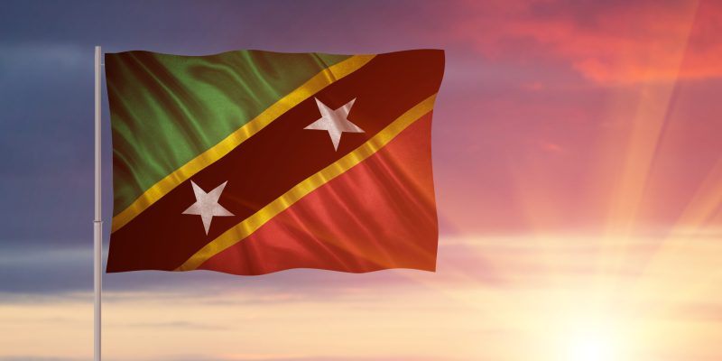 Flag with original proportions. Closeup of grunge flag of Saint Kitts and Nevis